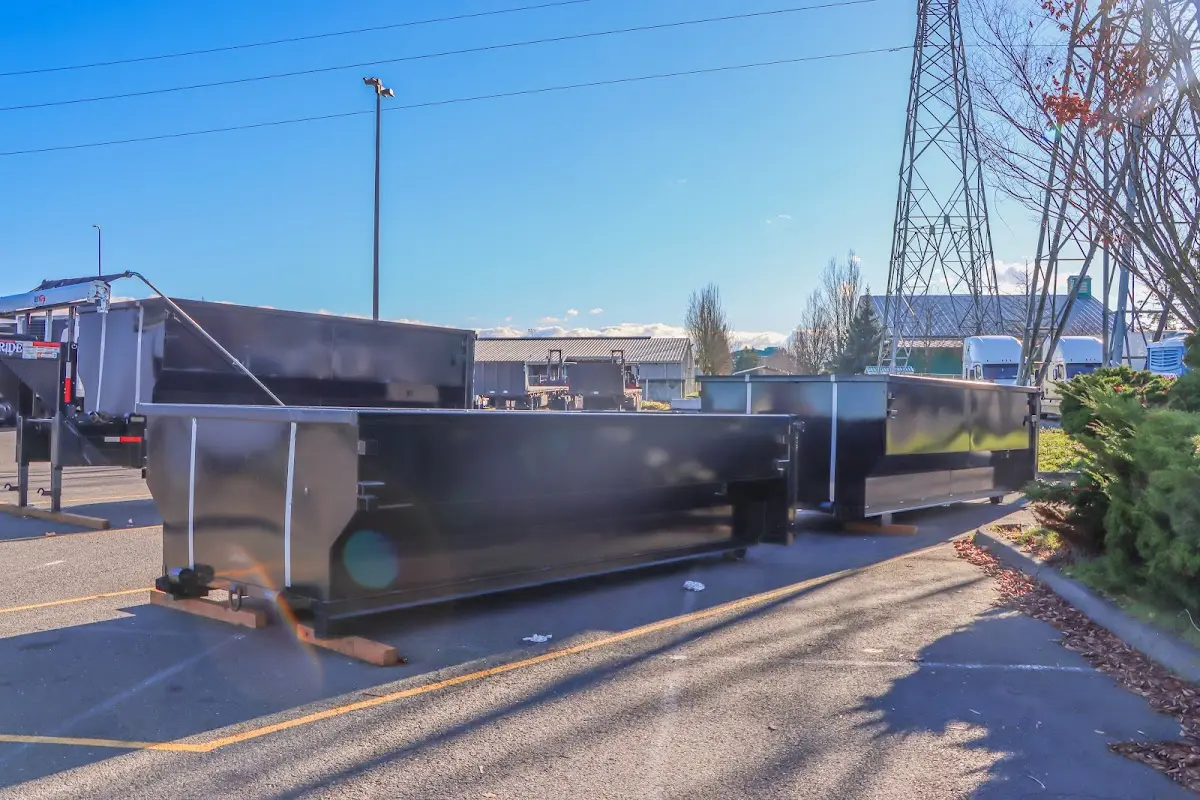 Roll-off dumpster ready for waste disposal at job site for 12 Yard Dumpster Rental in Social Circle